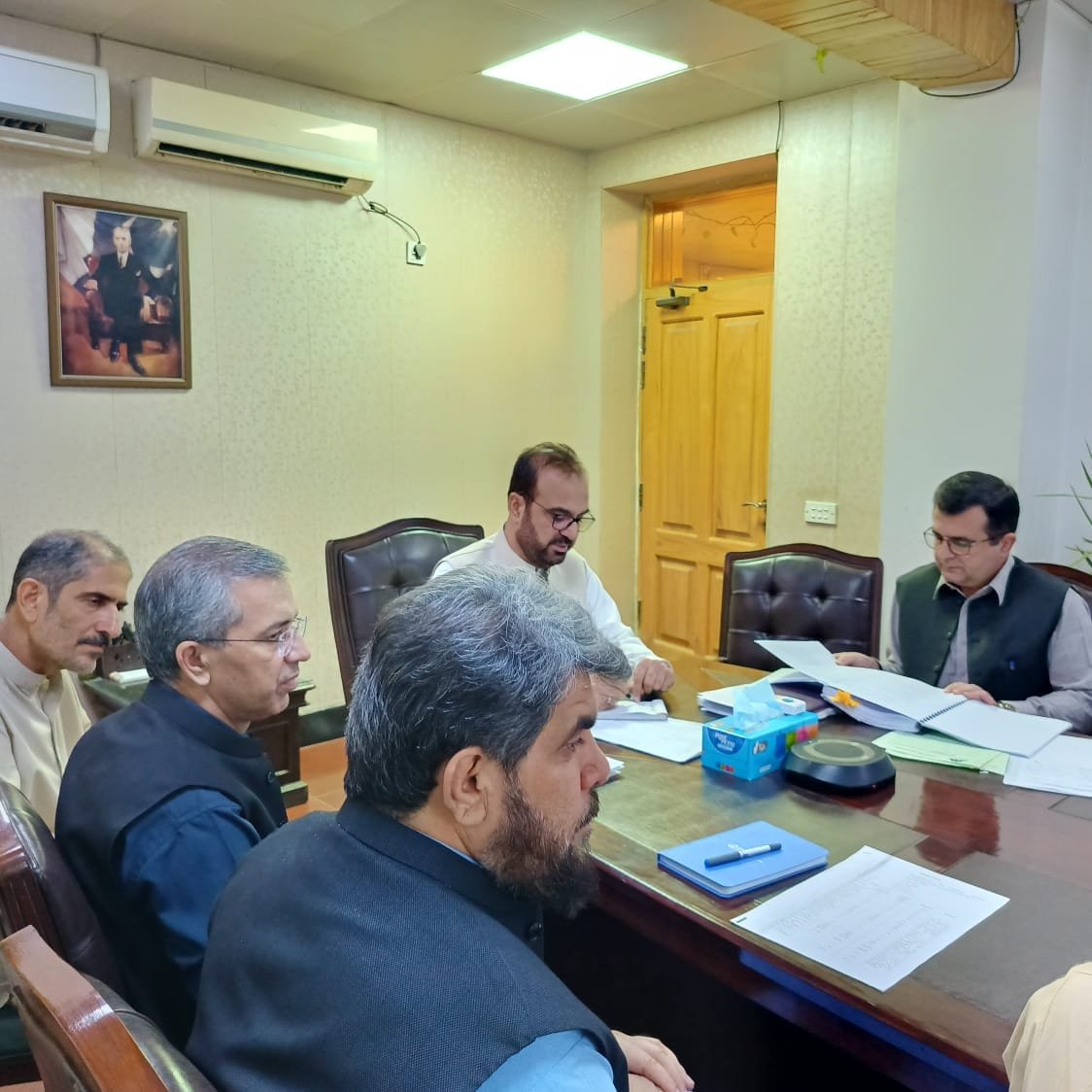 Group of key officials, including ACS (Dev) Hafiz Abdul Basit, Secretary C&W Lal Jan Jaffer, Special Secretary Home Abdul Nasir Dotani, and other participants, attending the PDWP meeting to review the establishment of a forensic science laboratory in Quetta