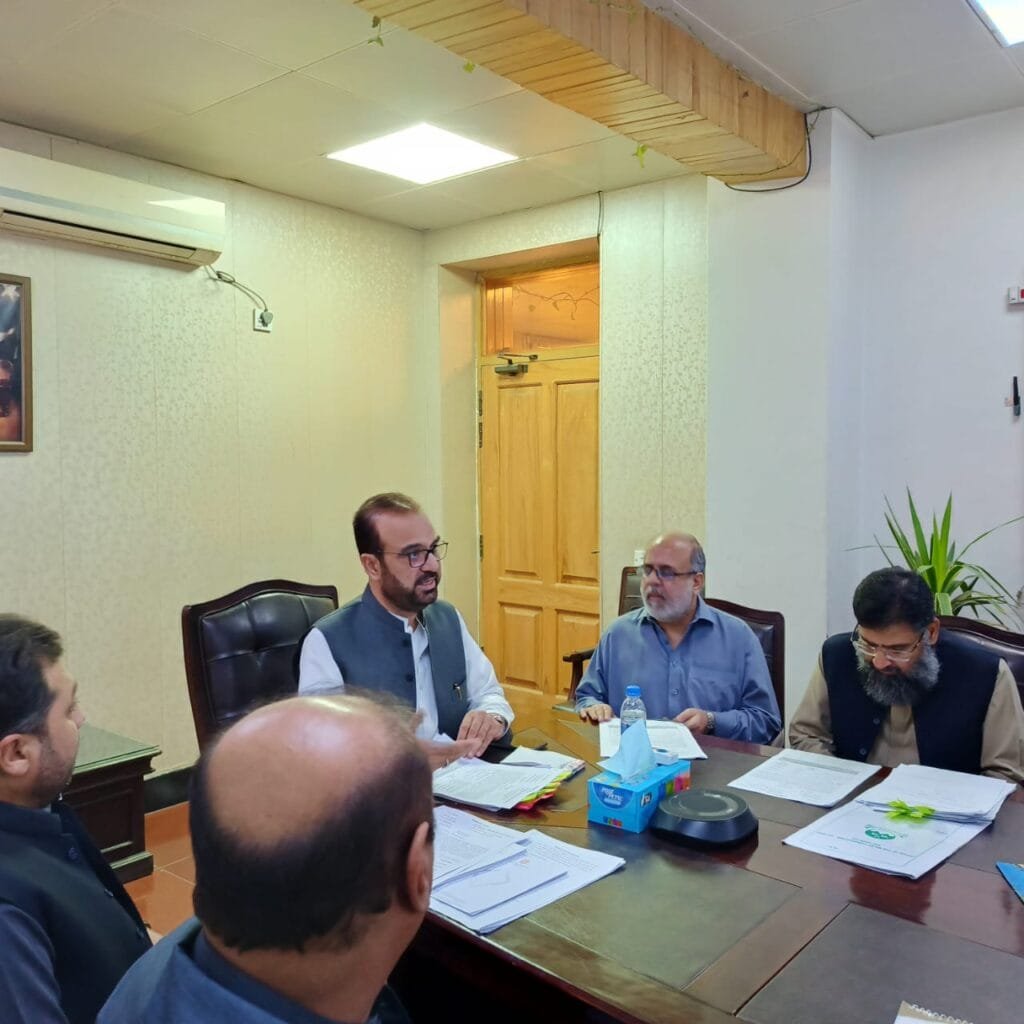 Meeting of key stakeholders, including government officials and disaster management experts, discussing initiatives for enhancing disaster preparedness and response in the province